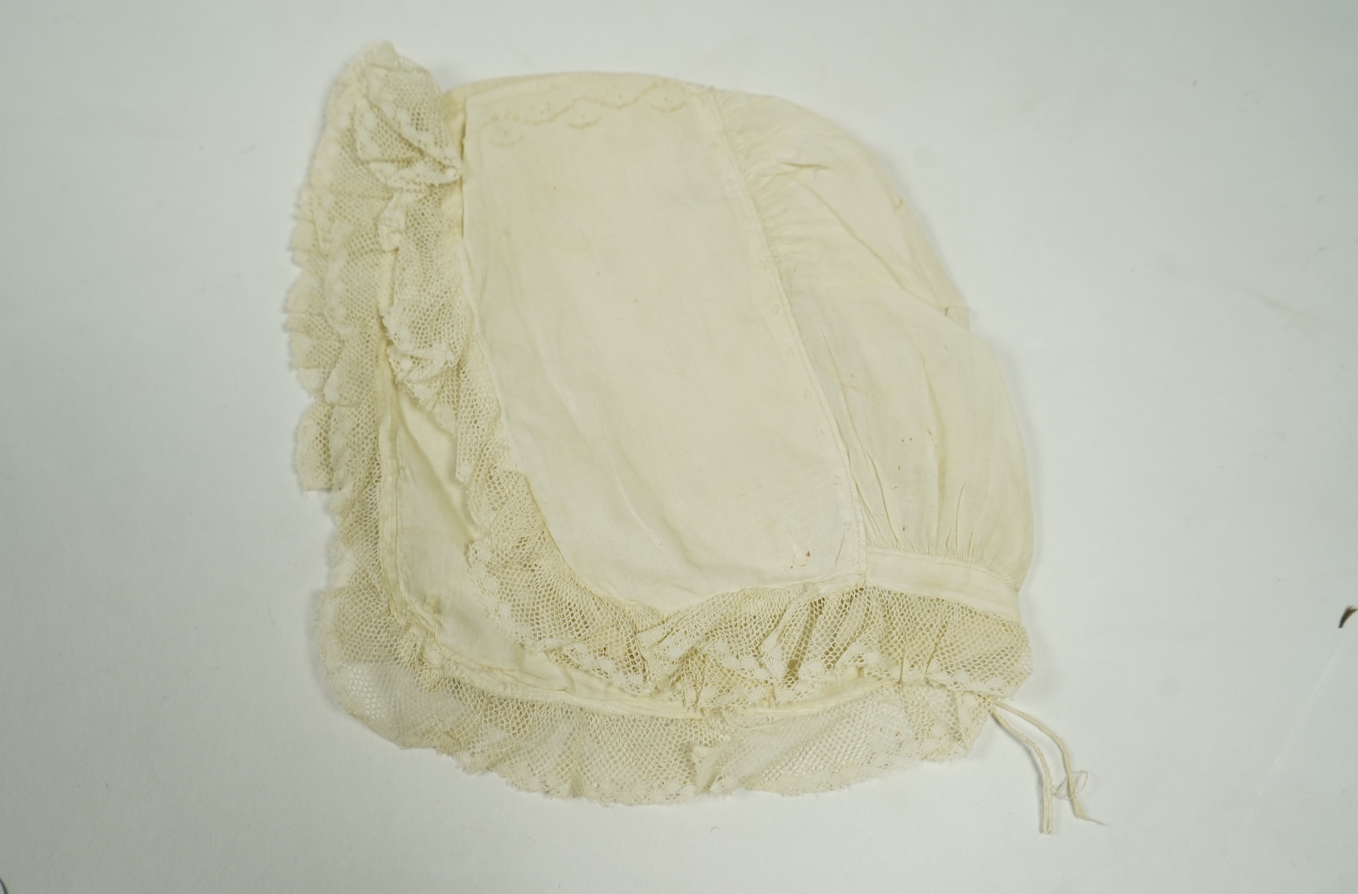 A collection of six baby’s bonnets from the mid 18th century to the late 19th century. An 18th century Hollie Point inserted baby bonnet, a quilted 18th century baby bonnet, two white work bonnets with needle lace crown